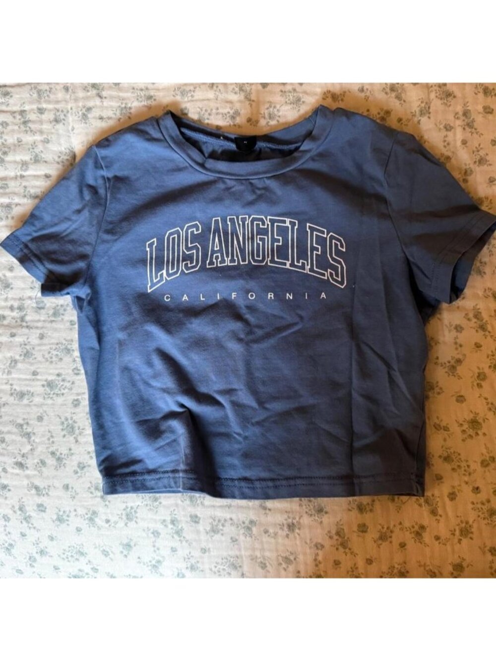 Dusty blue SHEIN Los Angeles California baby tee with white text reading